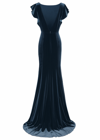 Blue velvet gown with low back on a white background by TH&TH bridesmaids.