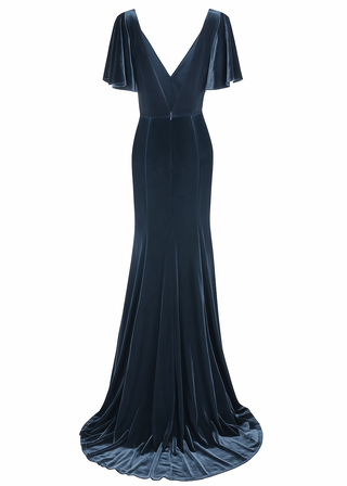 Blue velvet gown with flutter sleeves and low open back detail on a white background by TH&TH bridesmaids.