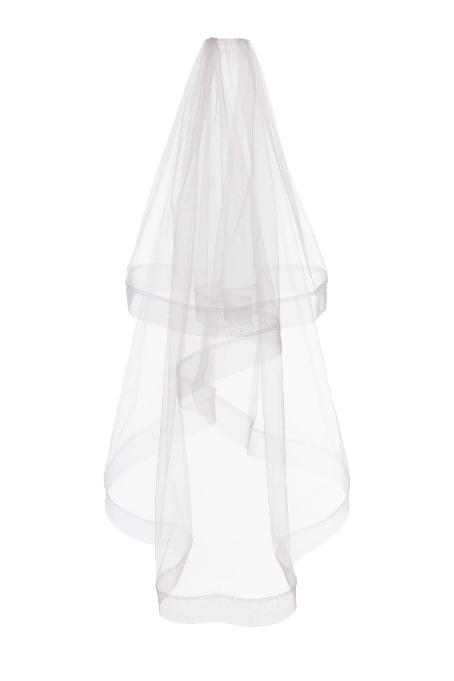 The Alexandra Crinoline Veil by TH&TH is a white, sheer double-tier bridal veil with a simple raw edge, shown against a plain white background for a modern wedding look.