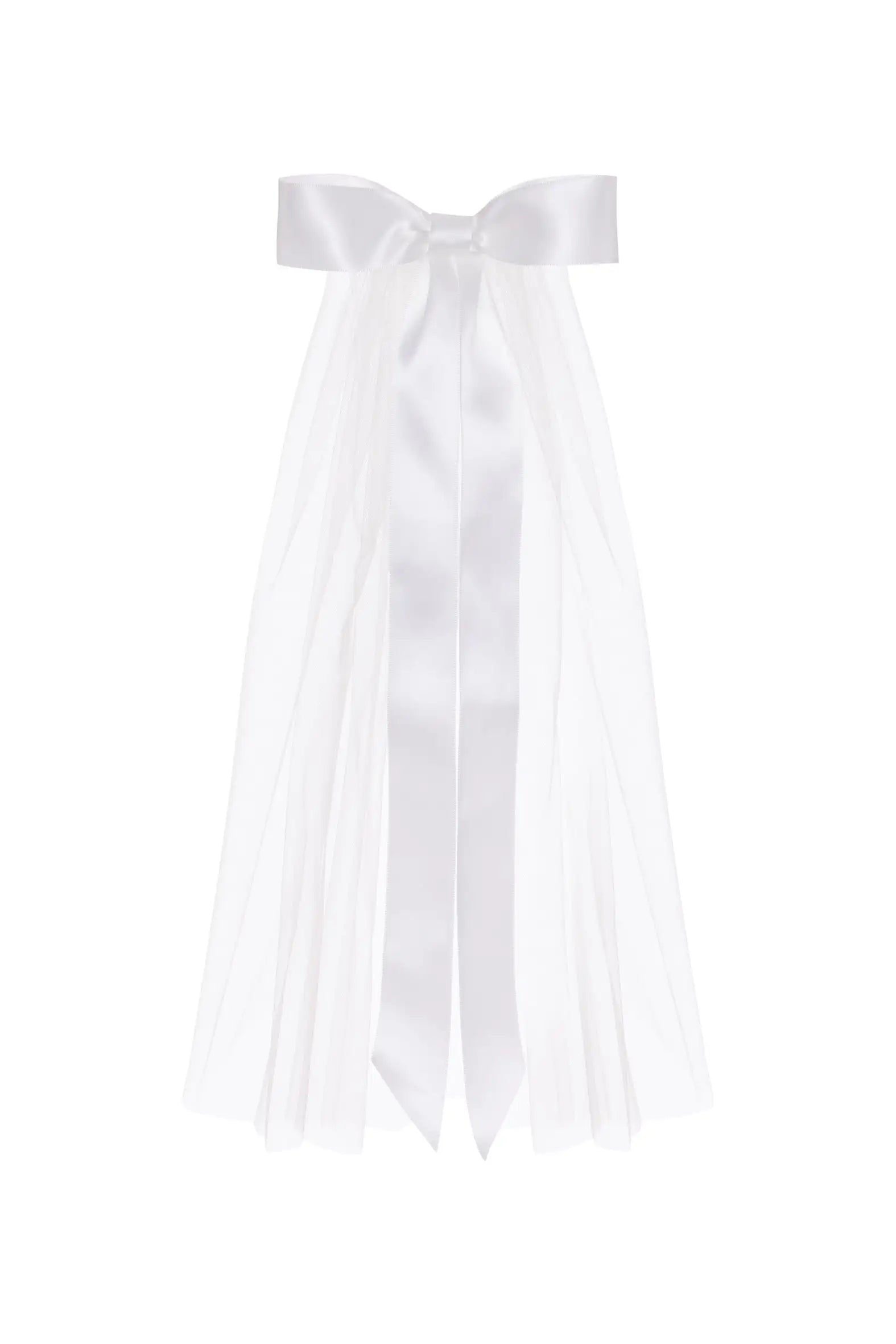 The Ariana Top Bow Veil by TH&TH features a white satin ribbon bow with long tails and sheer tulle streamers, ideal as a wedding hair accessory or mini bridal veil. Shown against a plain white background.