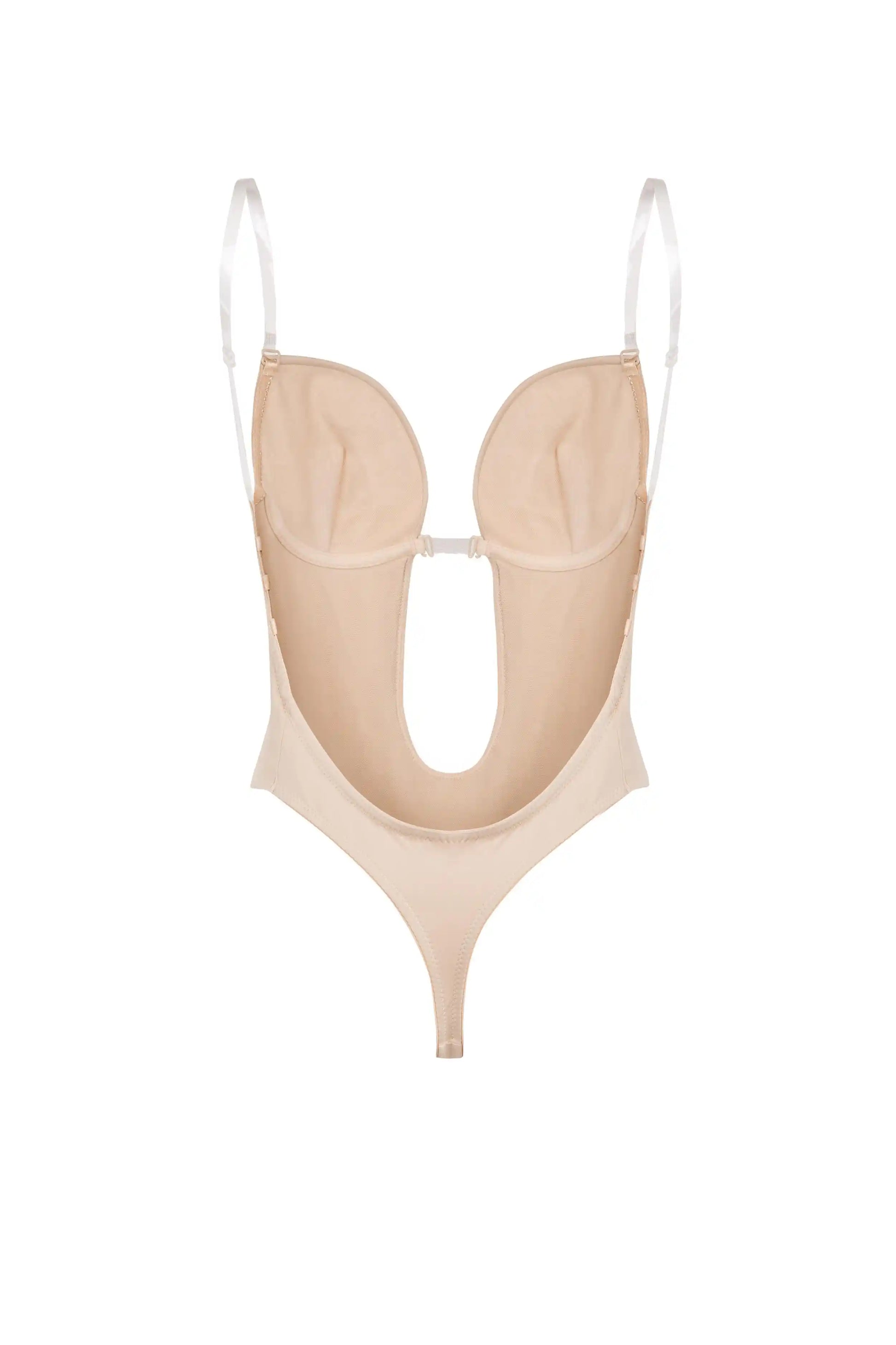 The TH & TH Backless Bodysuit In Cream Peach features a thong cut, underwire cups, adjustable white straps, and a large front cutout, shown against a white background.