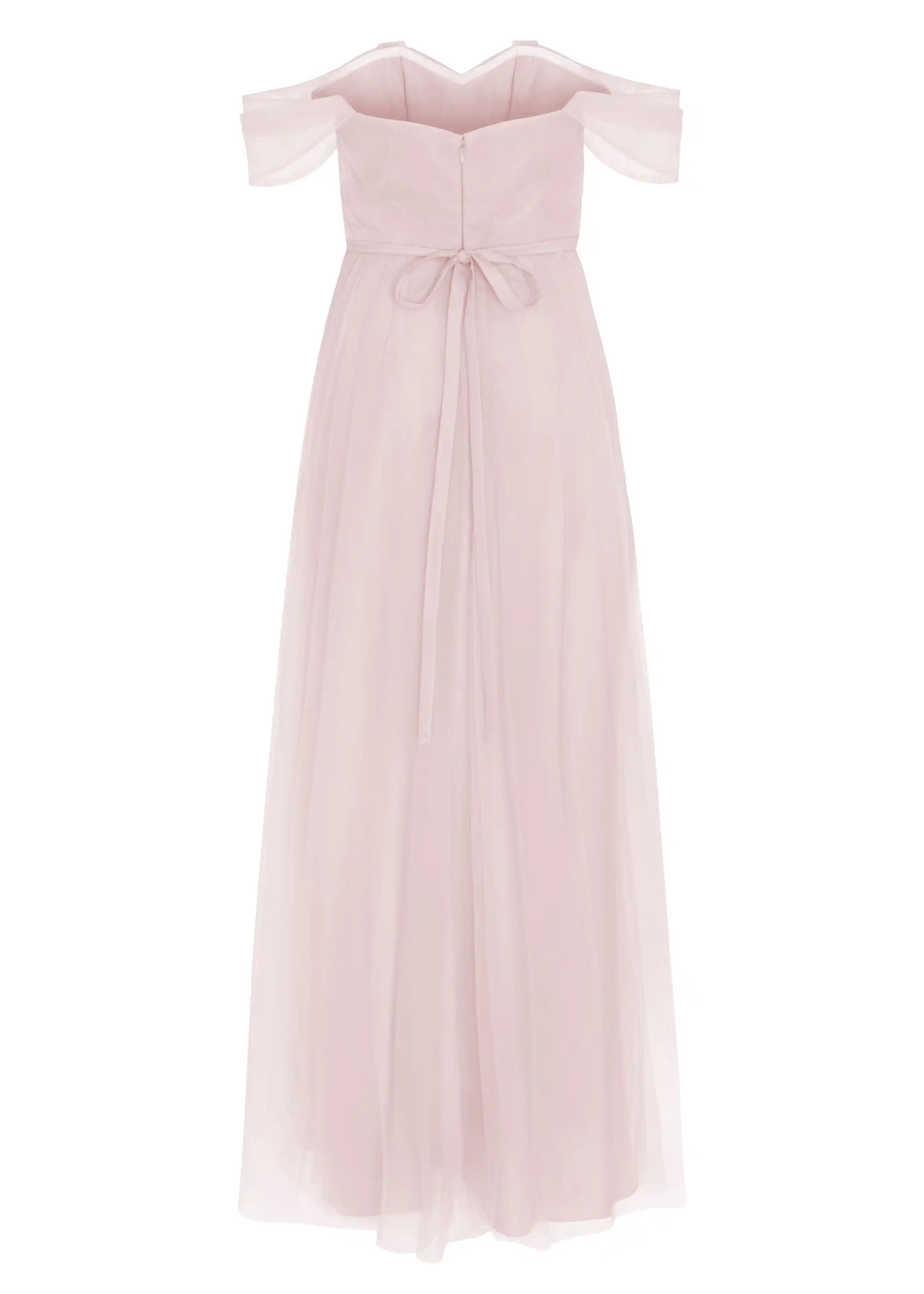 The Bardot Bridesmaid Dress in Smoked Blush Tulle by TH&TH features an off-the-shoulder neckline, short sleeves, fitted bodice with waist sash, and a flowing tulle skirt for an elegant look.