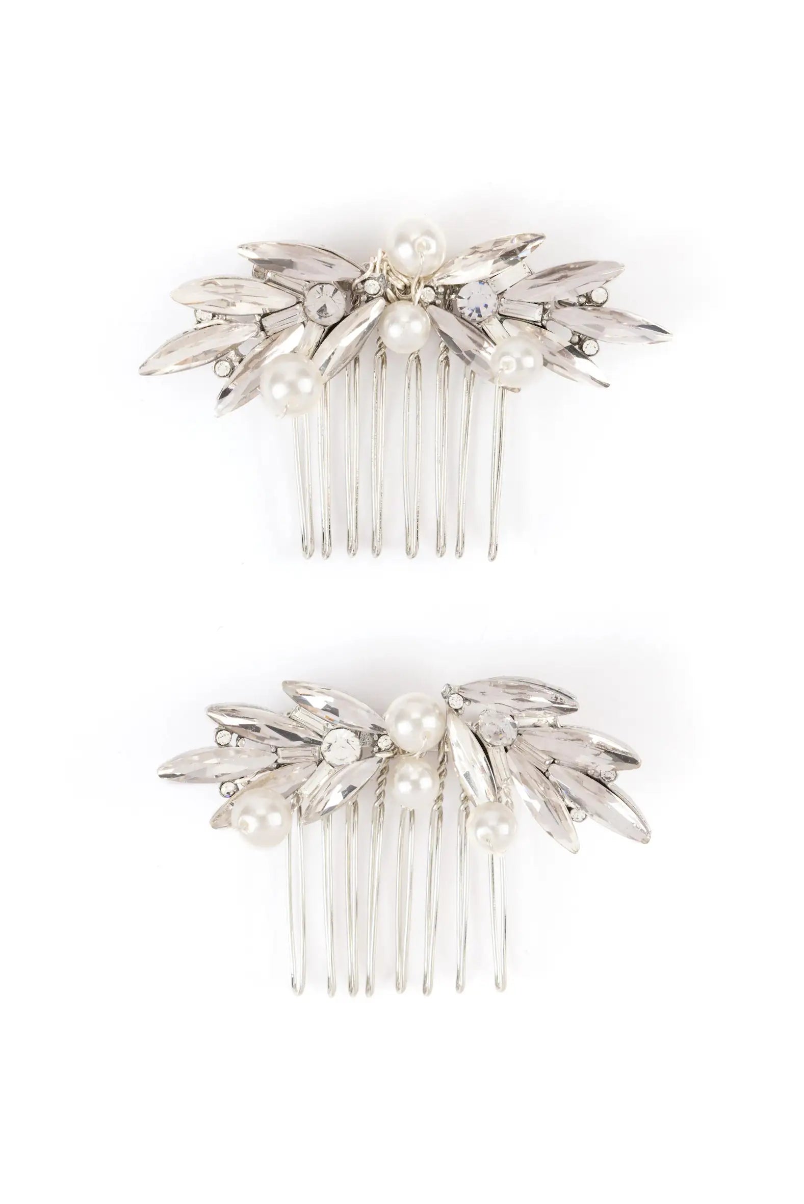 The TH&TH Beaumont Crystal and Pearl Leaf Hair Comb 2pcs set features elegant silver combs with pearl-like beads and crystal leaf accents, displayed on a white background—ideal for adding sophistication to bridal hairstyles.