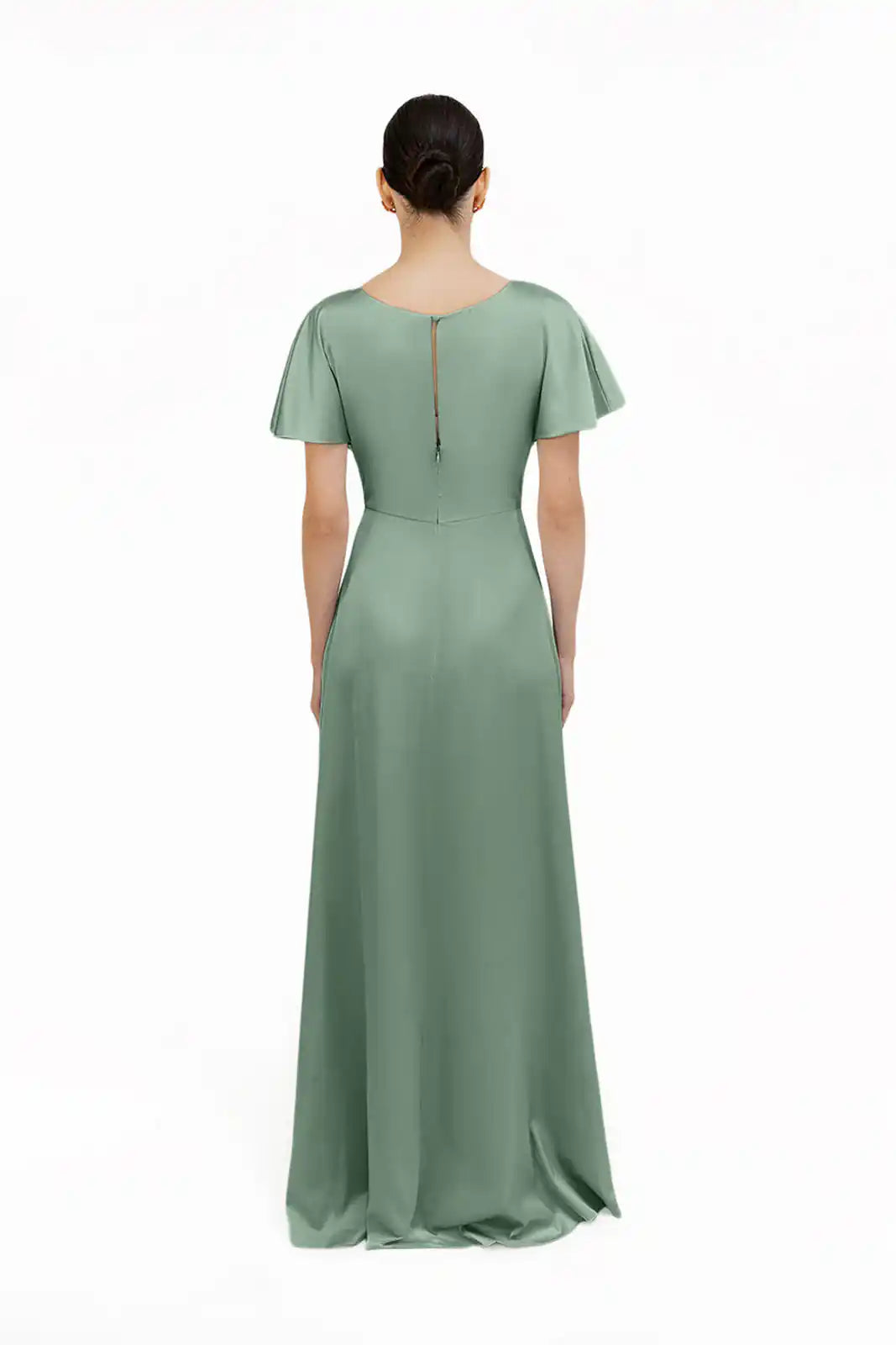 A woman faces away, modeling the TH&TH Camilla Bridesmaid Dress in sage green satin. This size-inclusive dress features a twist-knot bodice, short flutter sleeves, and a back zipper against a plain white background.