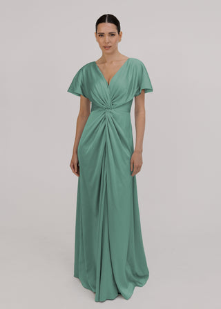 Woman wearing a green bridesmaid dress