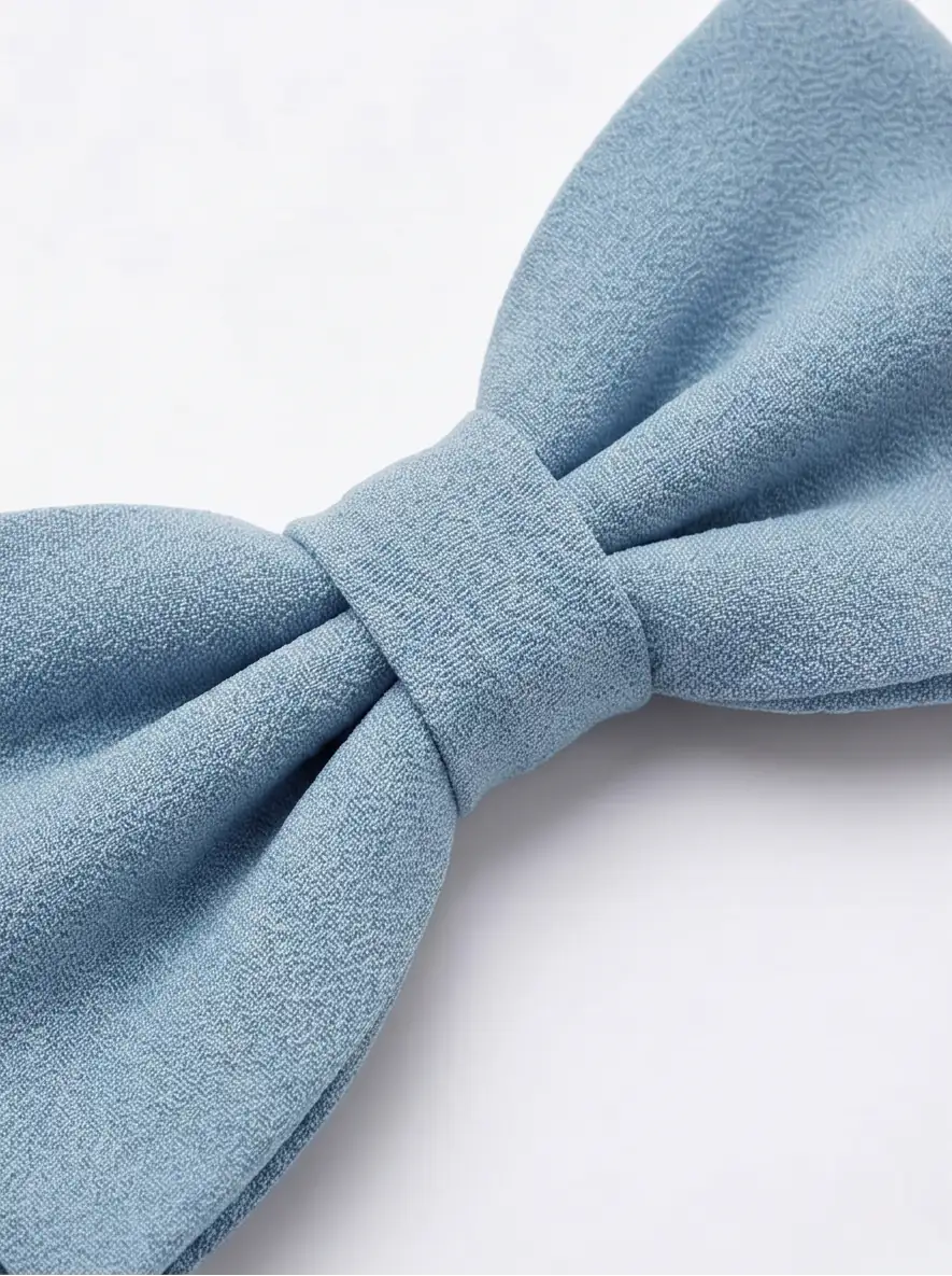 Close up of light blue moss crepe bow tie
