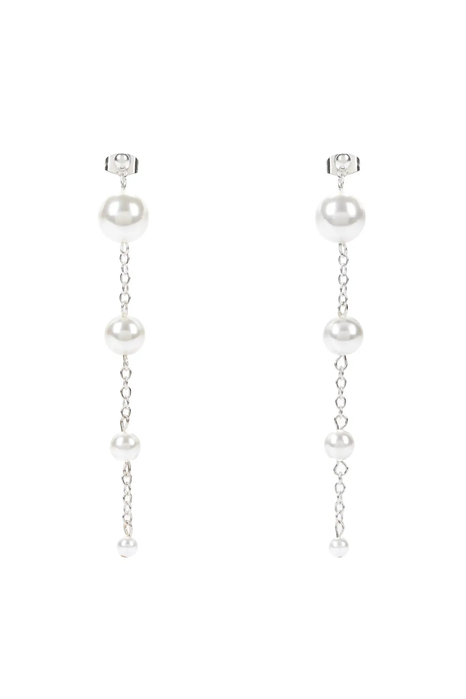 The Empress Pearl Drop Earrings by TH&TH feature three white pearls of varying sizes on a delicate silver chain with classic stud tops, offering a minimalist and elegant look ideal for bridal or wedding ceremony jewellery.