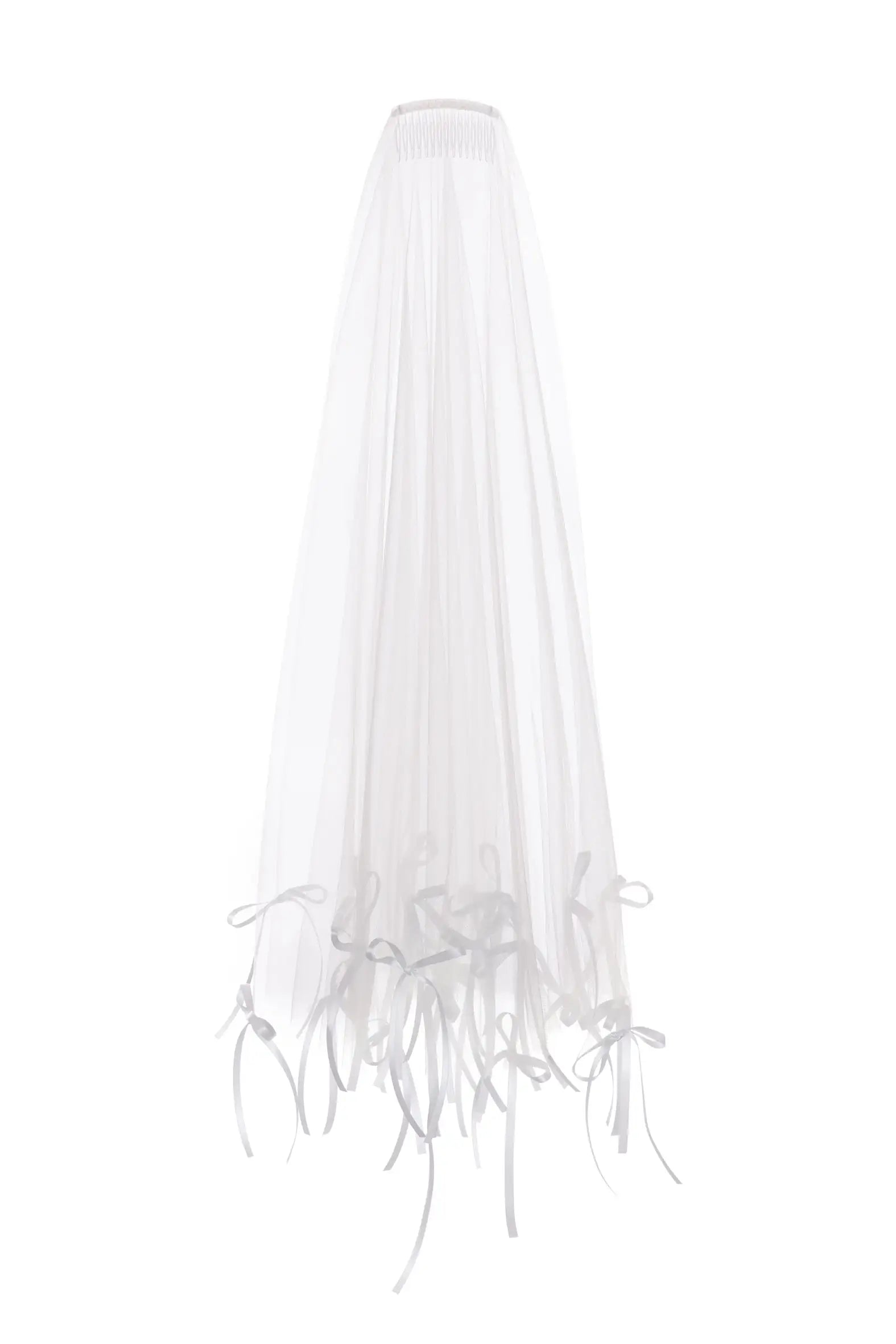 The Gigi Scattered Bow Veil by TH&TH features sheer white tulle and delicate decorative bows near the hem, making it a perfect ethereal statement accessory or a striking bridal veil.