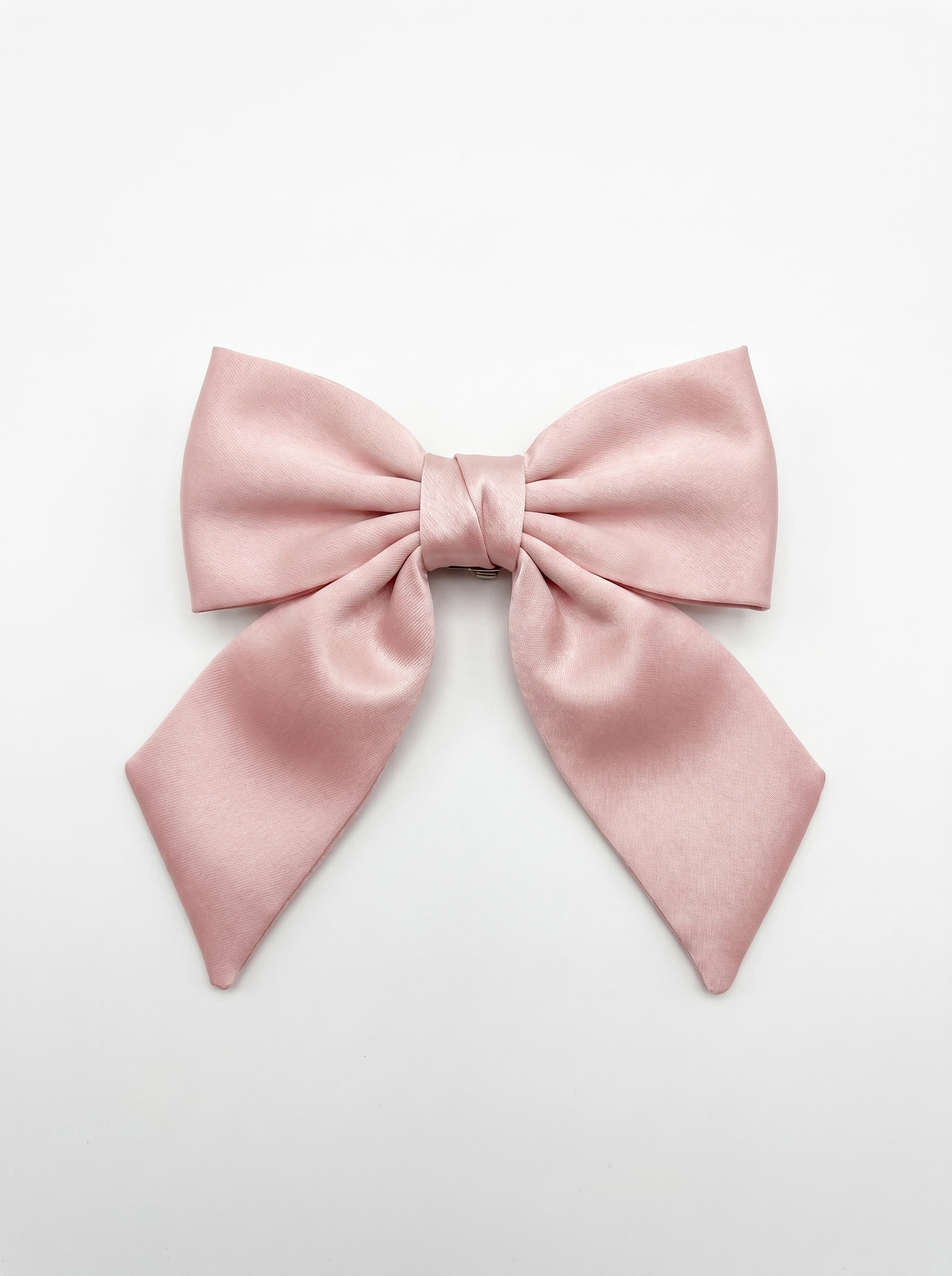 Pink bow on a light gray background