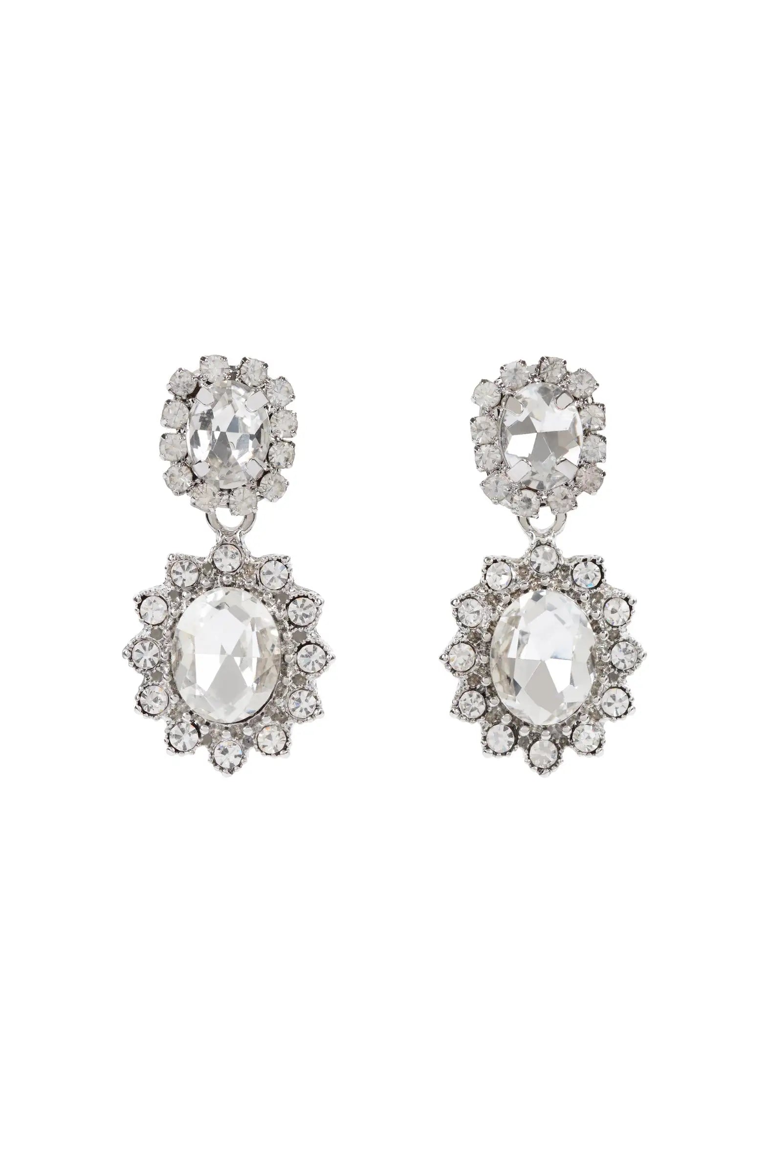The Imperial Silver Crystal Drop Earrings by TH&TH feature large oval crystals framed by smaller round stones in silver-tone metal—perfect handmade UK bridal jewellery.