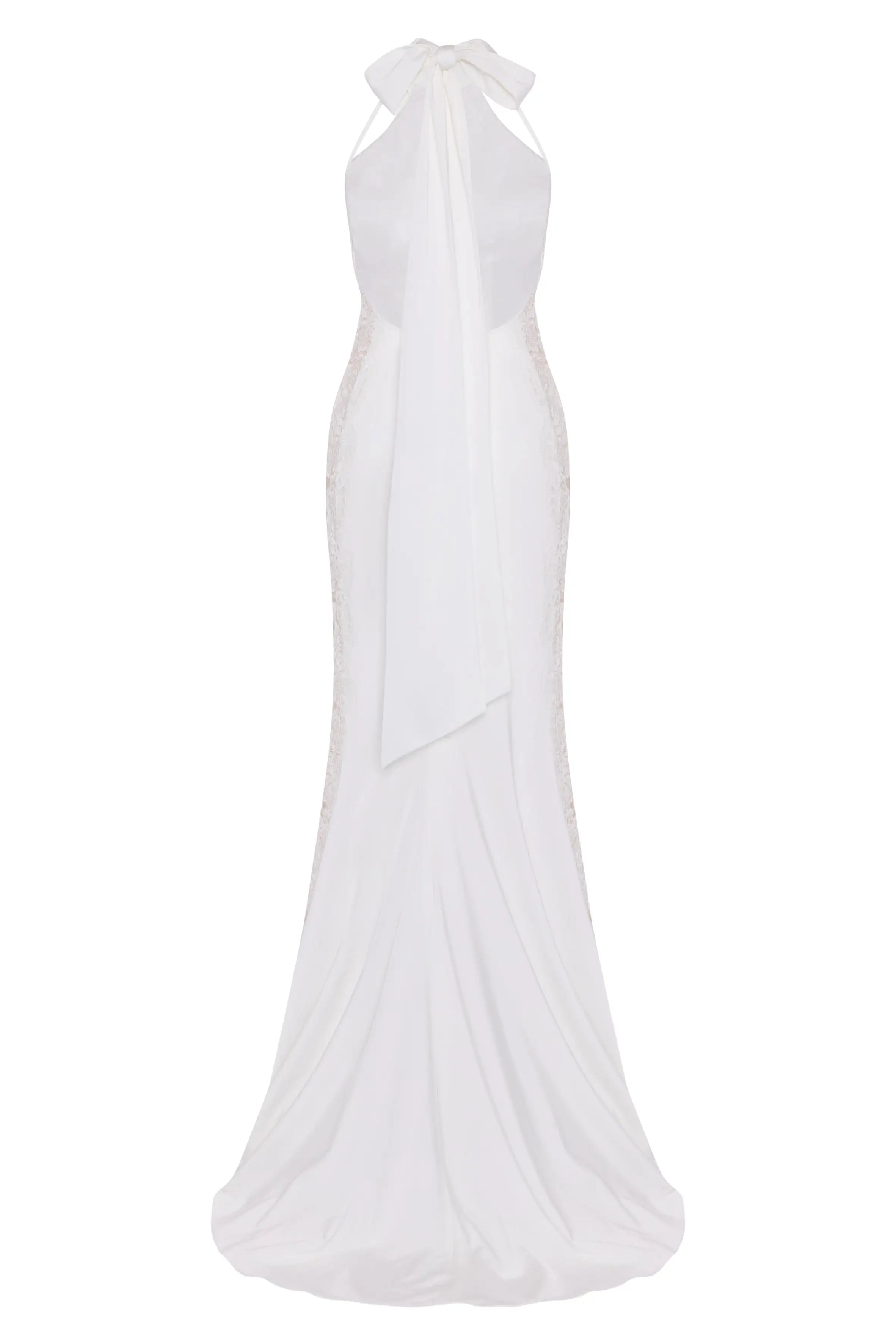 The Luisa Bridal Dress in Ivory by TH&TH features a halter neckline, flowing skirt, dramatic back bow, and a fitted silhouette with light side embellishments for an elegant bridal look.