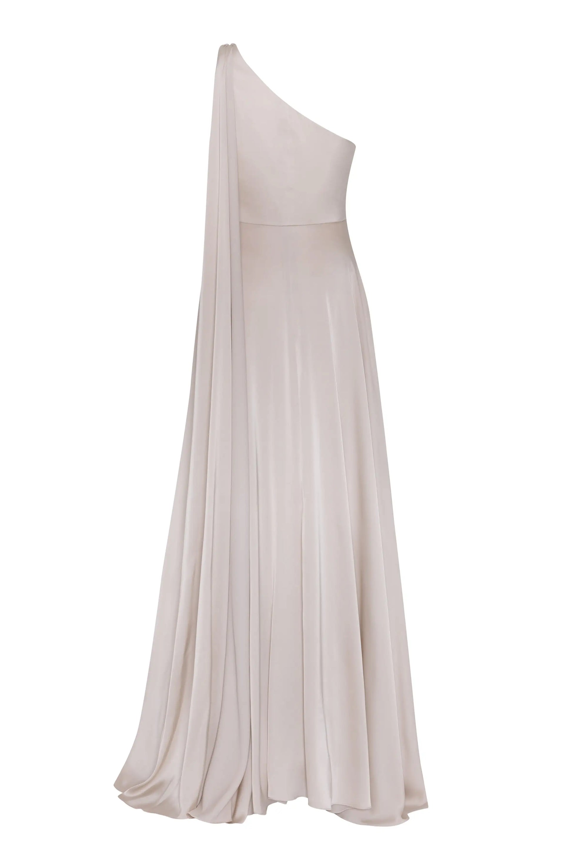 The Lyra Bridesmaid Dress in Oyster Satin by TH&TH is a size-inclusive, one-shoulder gown with a fitted bodice and softly pleated, floor-length skirt adorned with a graceful drape from shoulder to floor.