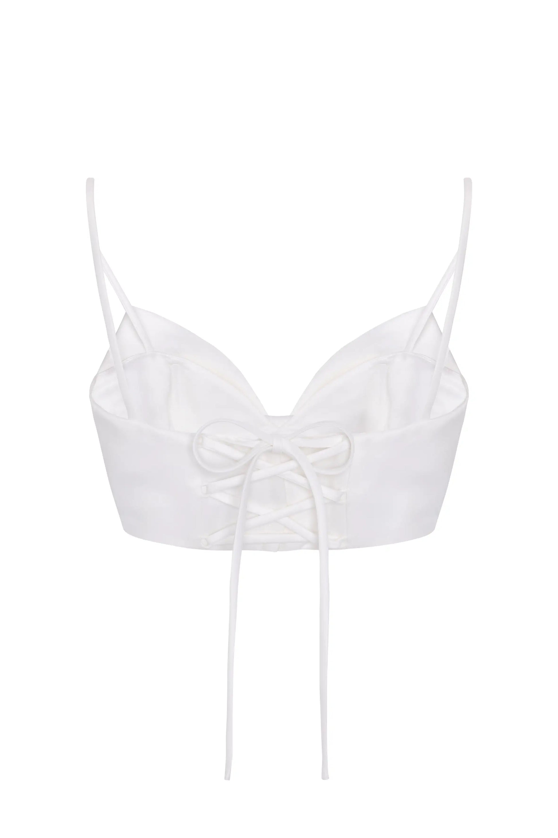 White crop top with bow detail on a white background