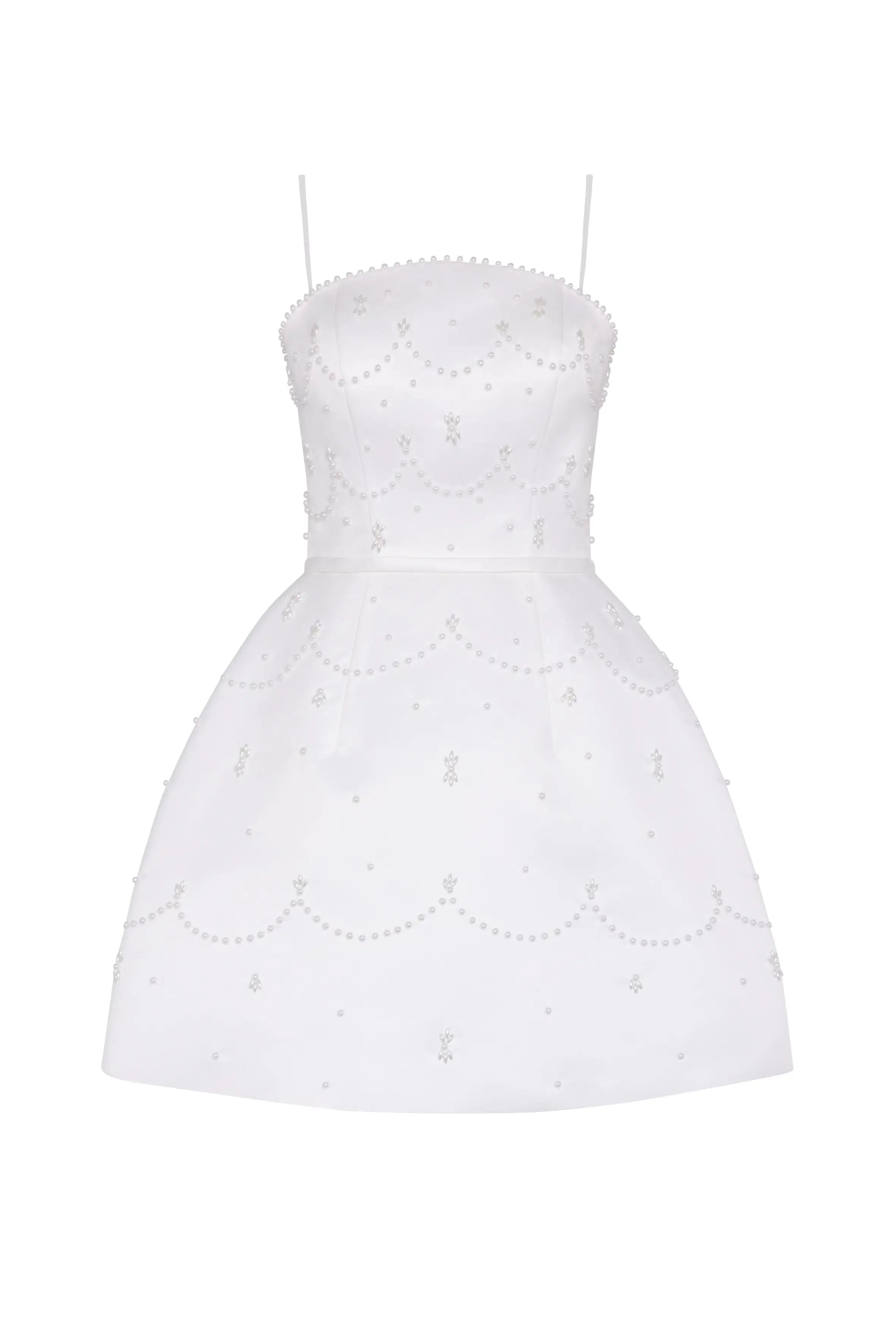 The Pearl Bridal Mini Dress in Ivory by TH&TH features a sleeveless design with thin straps, fitted bodice, A-line skirt, and delicate pearl and bead embellishments in scalloped and dotted patterns throughout.