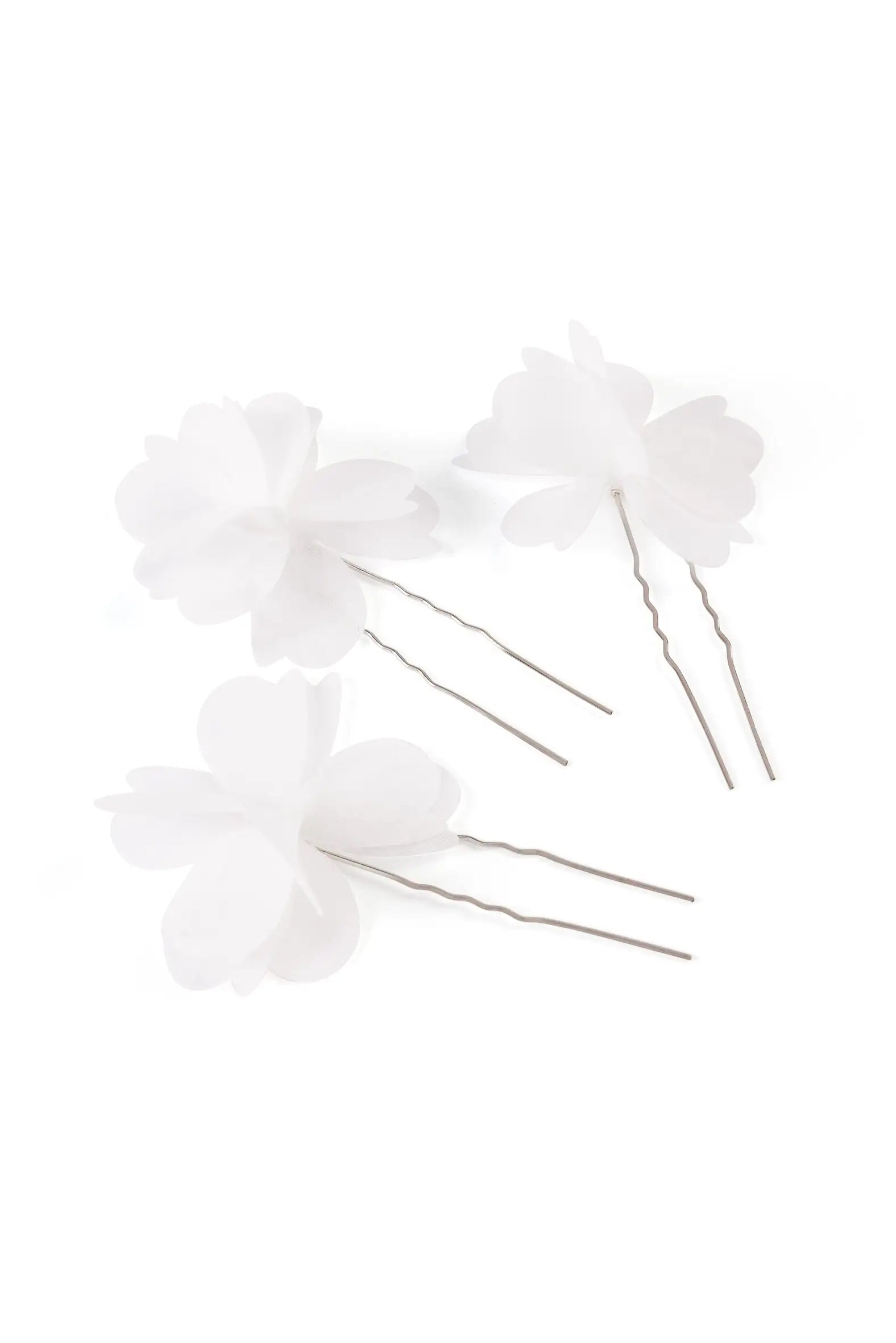 The TH&TH Petal Hair Pins 3pcs feature delicate, layered white chiffon flowers on wavy silver pins, elegantly arranged for bridal or wedding hair accessories.
