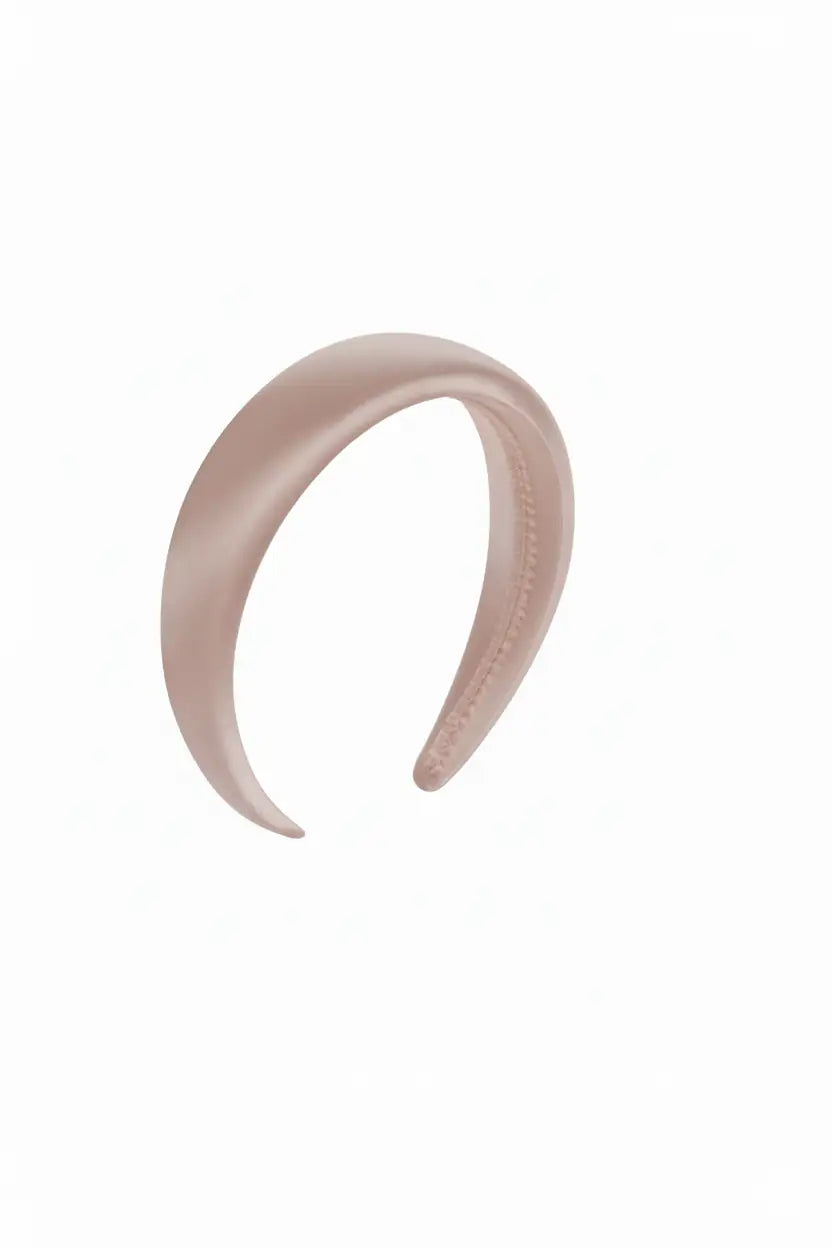 The TH&TH Liquid Satin Headband, crafted in padded light pink satin, is showcased on a plain white background—an elegant choice for bridal parties or as a chic bridesmaid accessory.