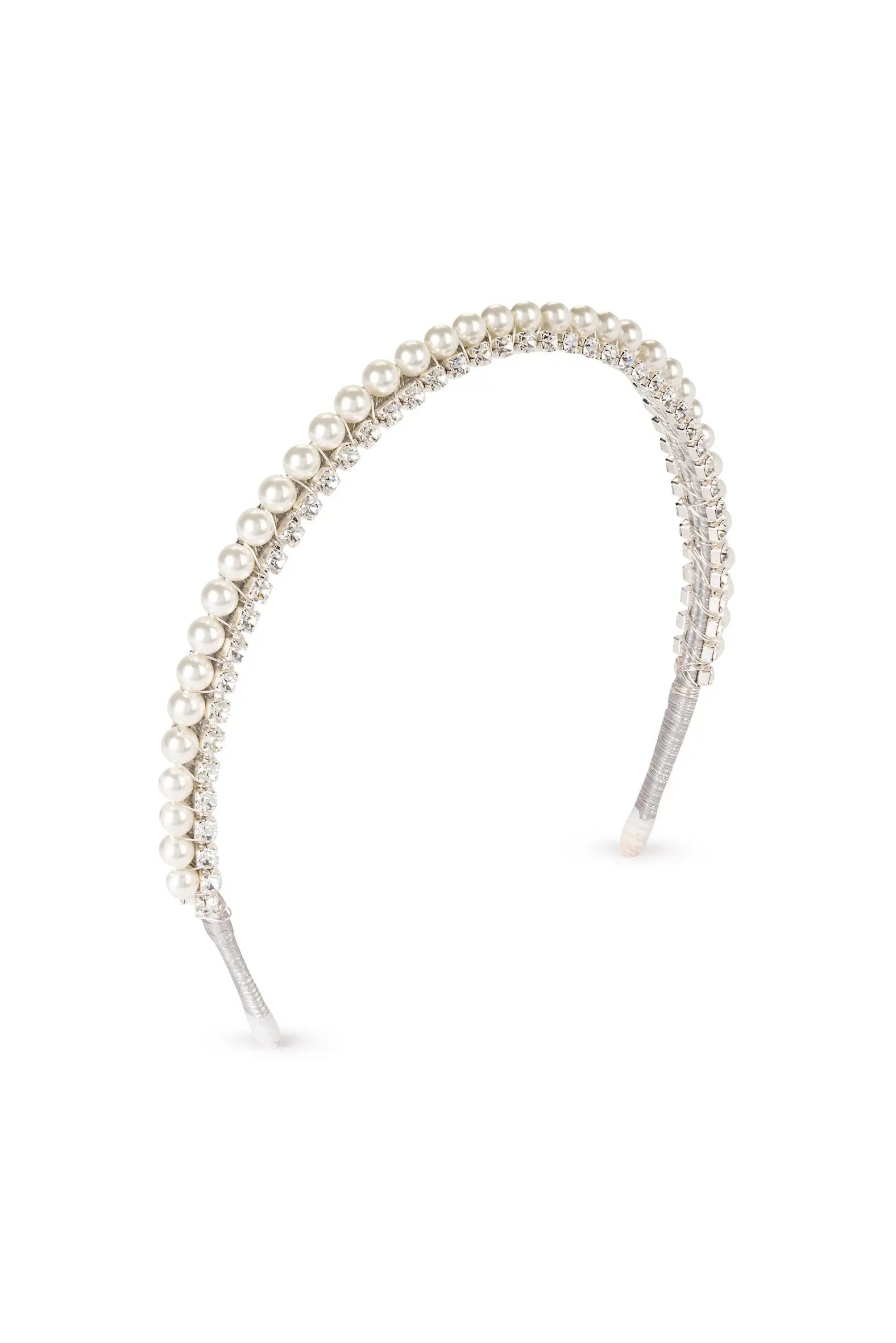 The Seraphine Crystal Headband by TH&TH features pearls and rhinestones on a slim metallic band—an elegant bridal hair accessory for your special day.