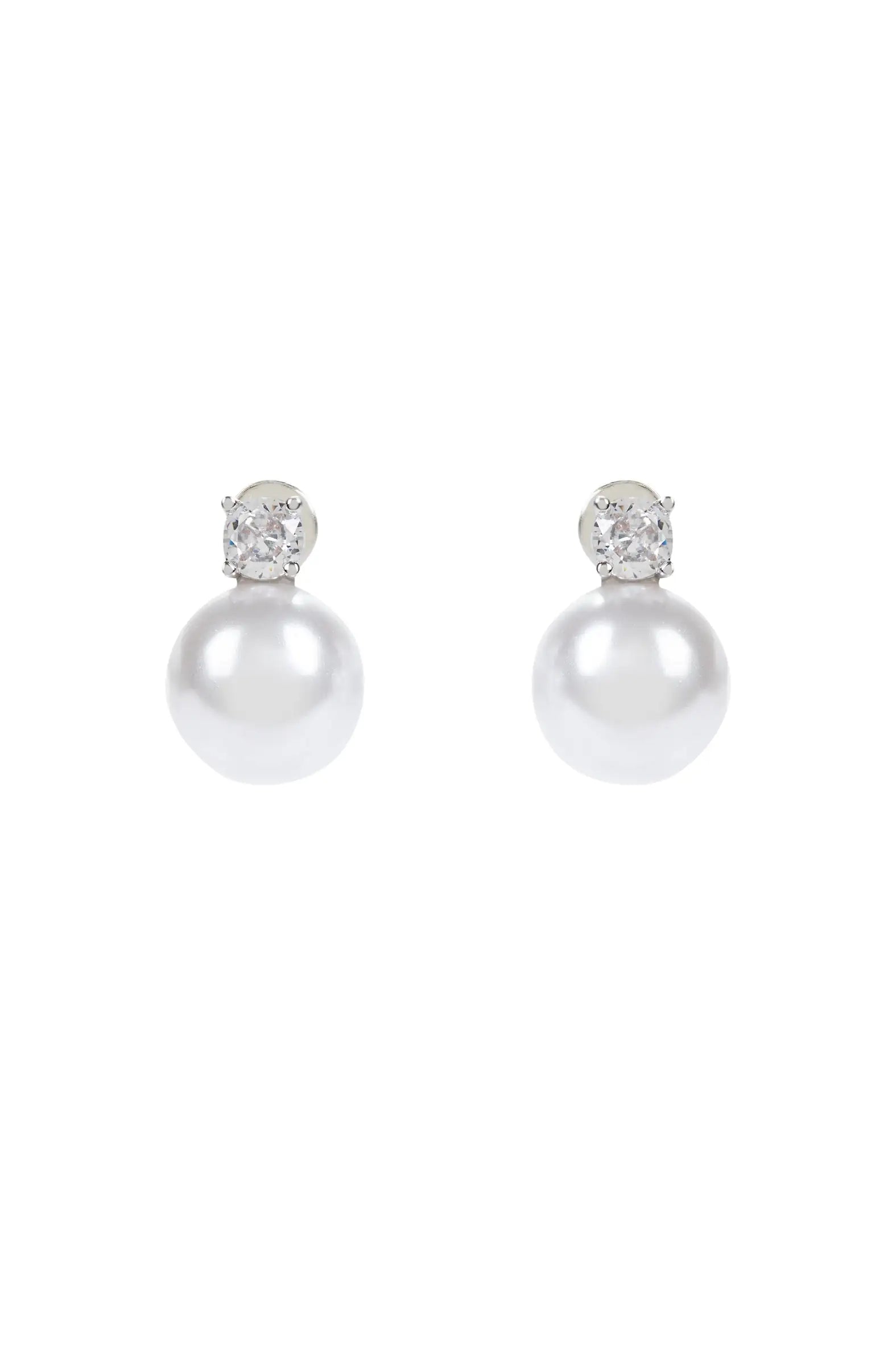 The Solace Stud Earrings by TH&TH feature a round white pearl suspended beneath a clear gemstone—perfect handmade UK bridal jewellery for those seeking elegant pearl crystal earrings.