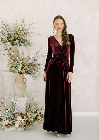 Burgundy velvet bridesmaid maxi dress with sleeves. Designed in the U.K.