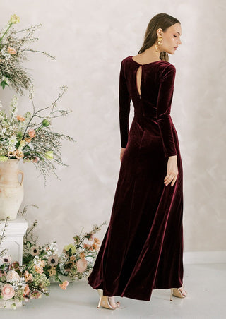 Burgundy velvet bridesmaid maxi dress with sleeves. Designed in the U.K.