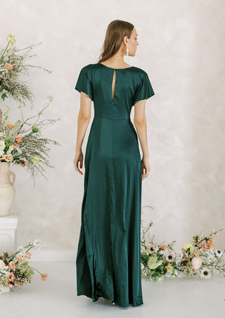Emerald satin bridesmaid dress with sleeves. Designed in the U.K.