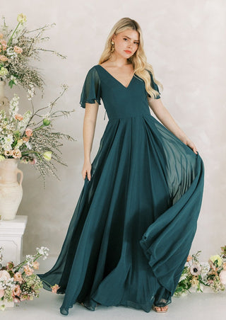 Emerald green chiffon bridesmaid dress with sleeves. Designed in the U.K.