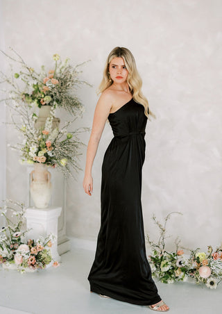 Black satin one shoulder bridesmaid dress. Designed in the U.K.