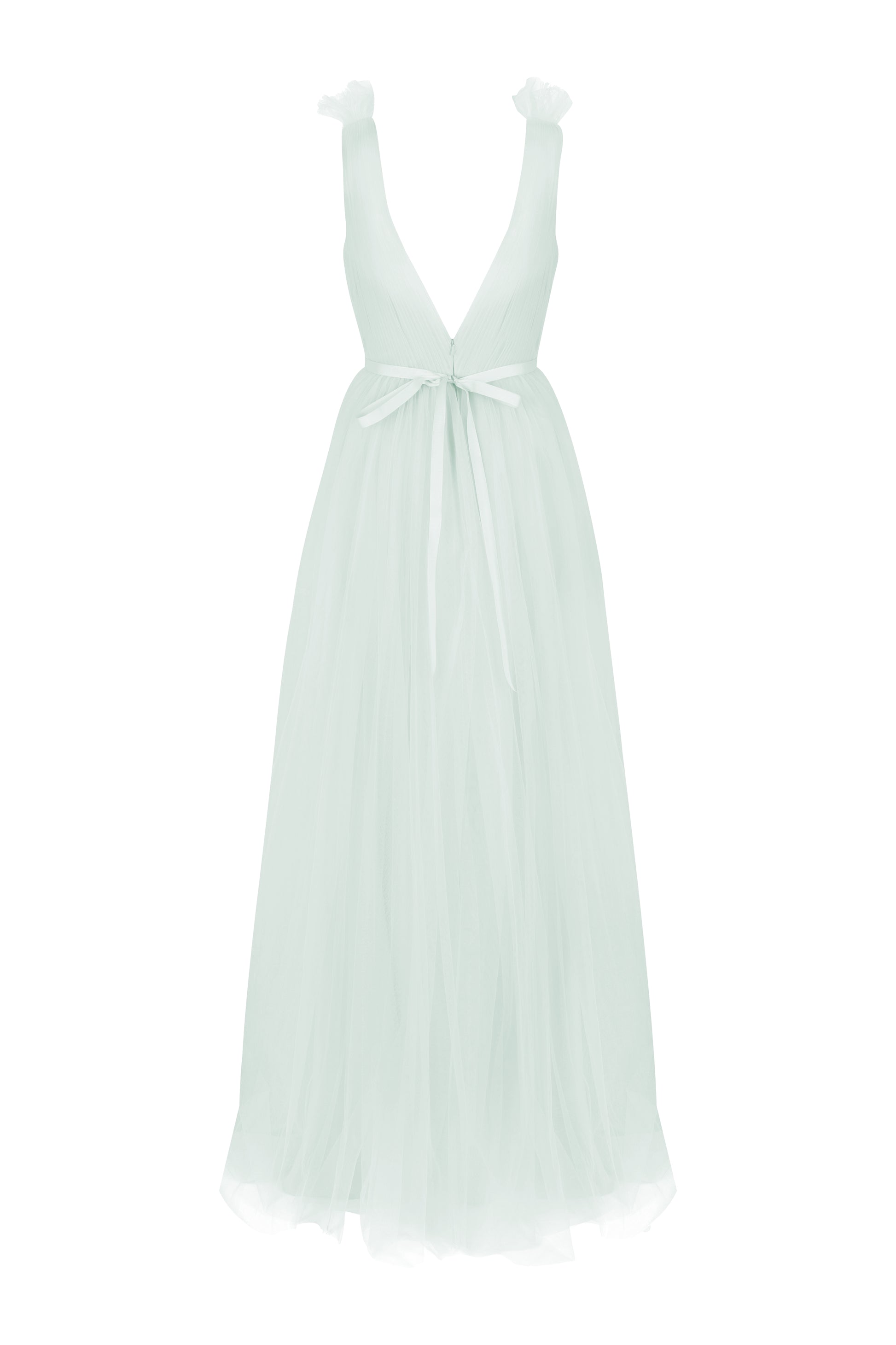 Light green dress with tulle straps  and bow at back, low v back detail on a white background by TH&TH bridesmaids. 