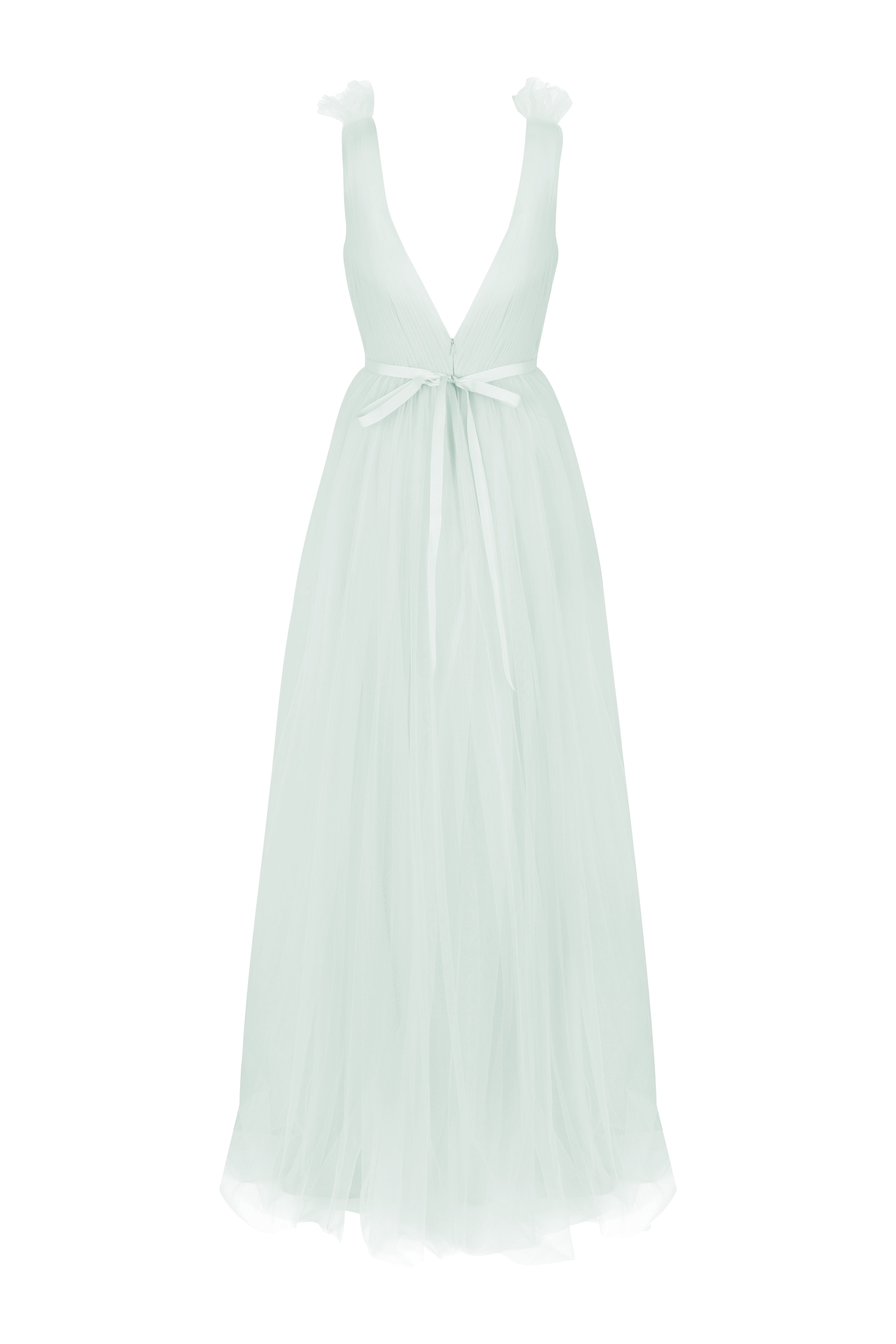 Light green dress with tulle straps  and bow at back, low v back detail on a white background by TH&TH bridesmaids. 