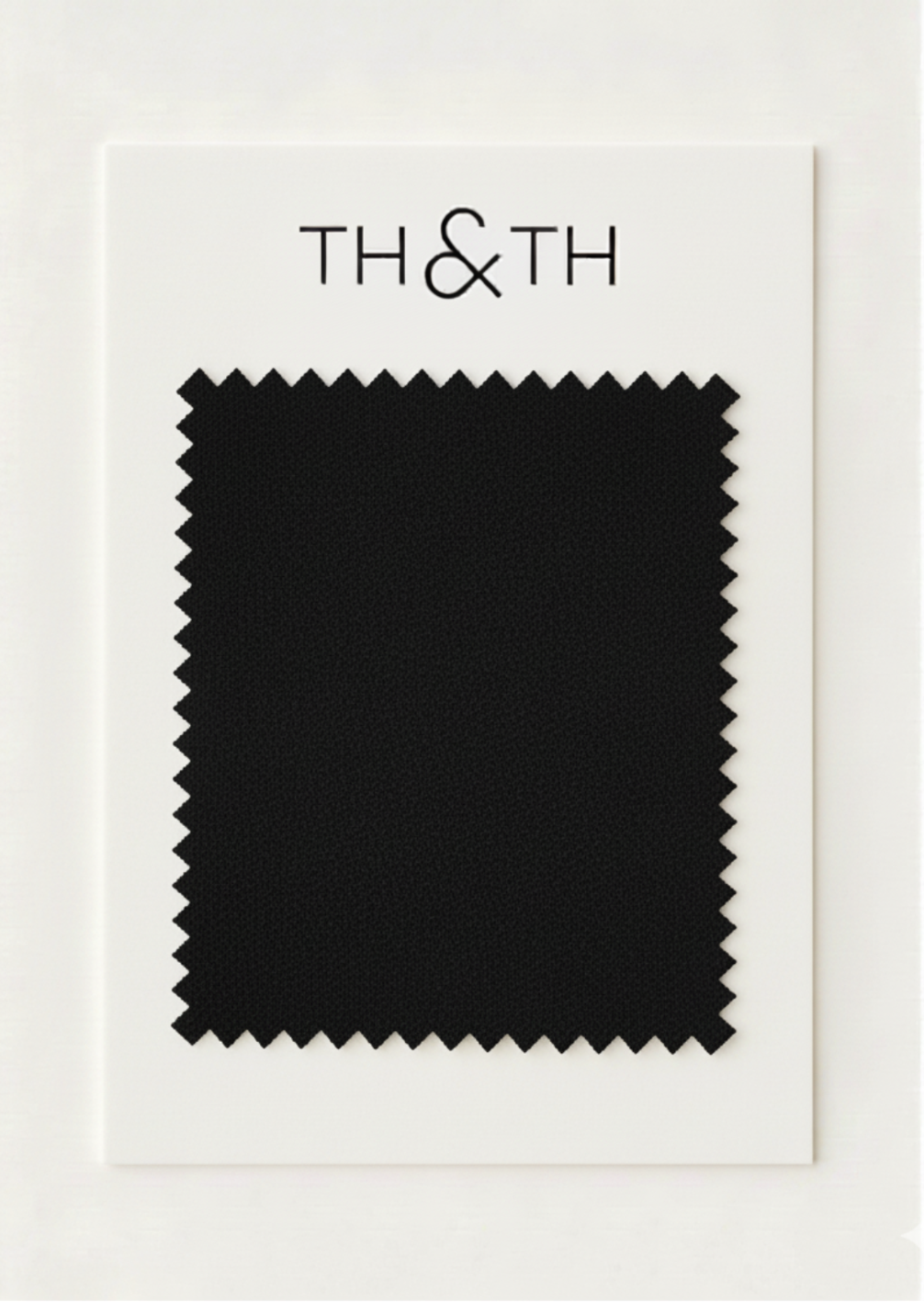 moss crepe fabric swatch on white card header.