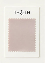 Fabric swatch card with 'TH&TH' branding on a white background