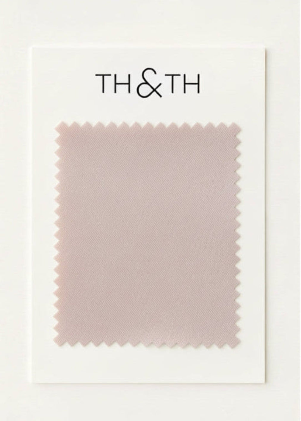 Fabric swatch card with 'TH&TH' branding on a white background