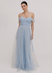 A dusty blue tulle bridesmaid dress with bardot sleeves by TH&TH Bridesmaids.
