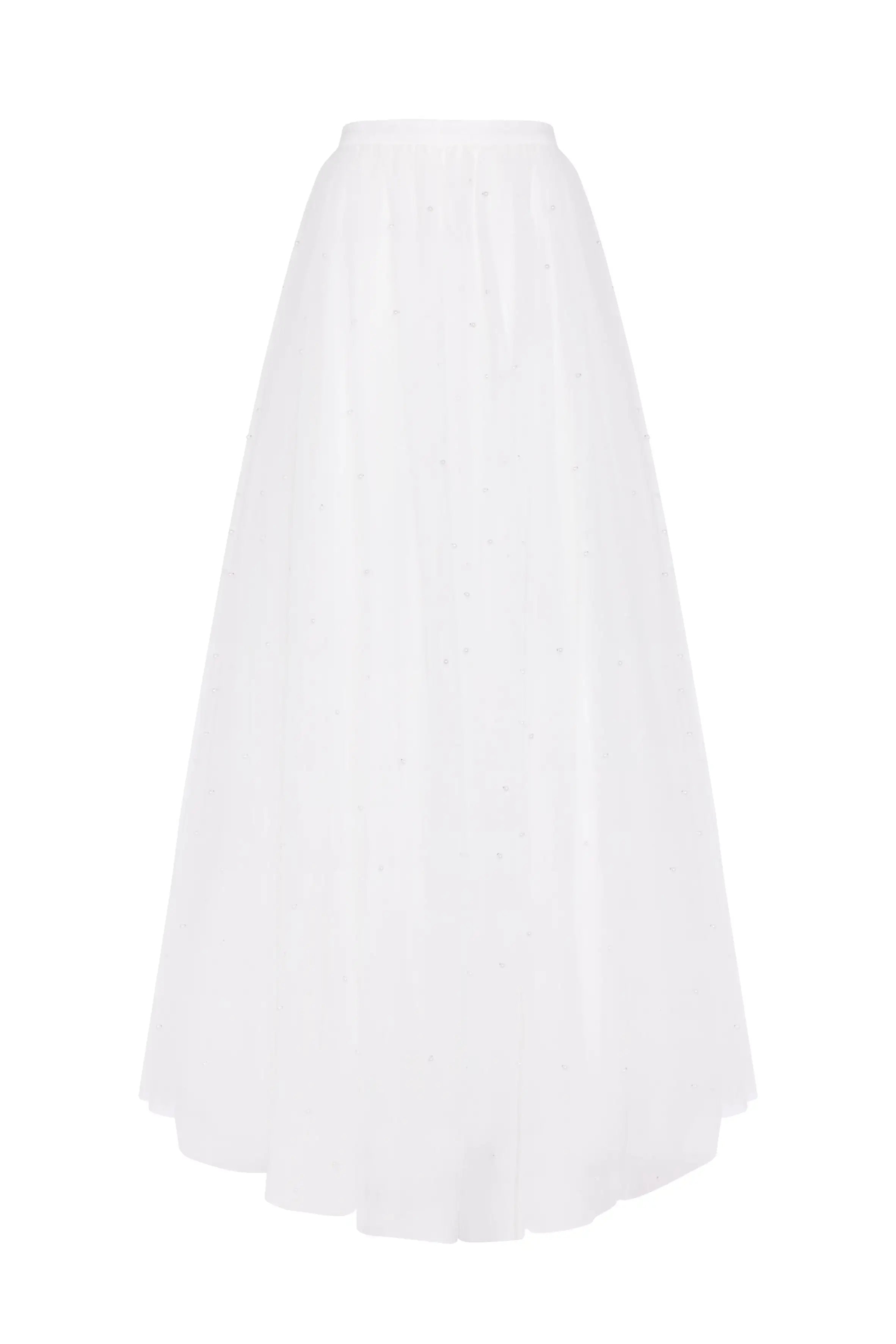 The Wyatt Bridal Skirt in Ivory Tulle by TH&TH features a long, flowing silhouette with a fitted waistband and subtle scattered embellishments. Displayed on a plain white background, it's ideal for modern bridal separates.