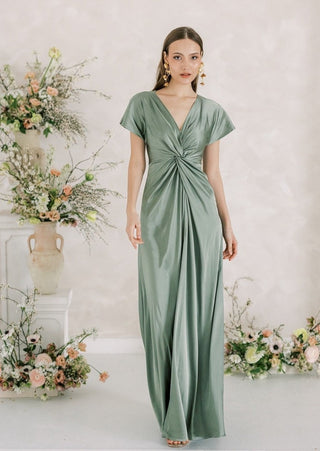 Sage green satin maxi bridesmaid dress with twist knot front detail..