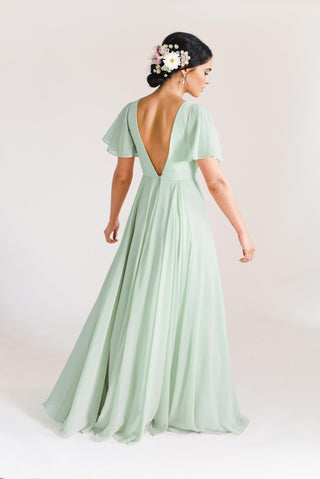 green bridesmaid dresses, model moving backview