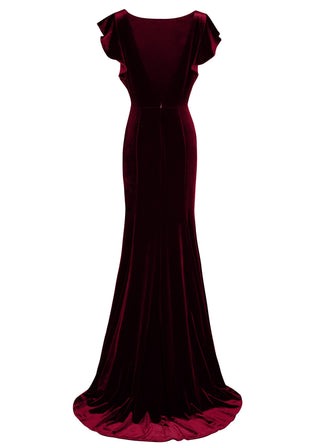 Bergundy velvet gown with flutter sleeves and low back on a white background by TH&TH bridesmaids.
