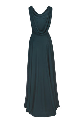 Woman wearing a long emerald dawn green bridesmaid dress with cowl front and front back and full skirt in chiffon.