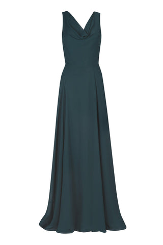 Woman wearing a long emerald dawn green bridesmaid dress with cowl front and front back and full skirt in chiffon.